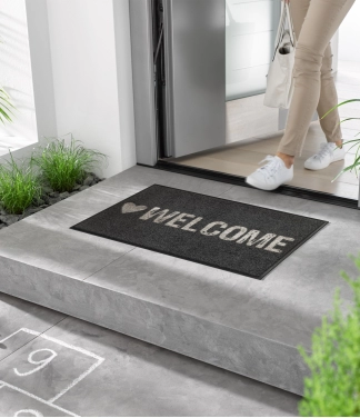 Durvju paklājs Kleen-Tex Wash+Dry Warmly Welcome