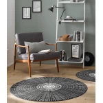 kokybiskas tamsus apvalus kilimas interjere