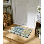 žalsvas durų kilimėlis prie namų durų 1